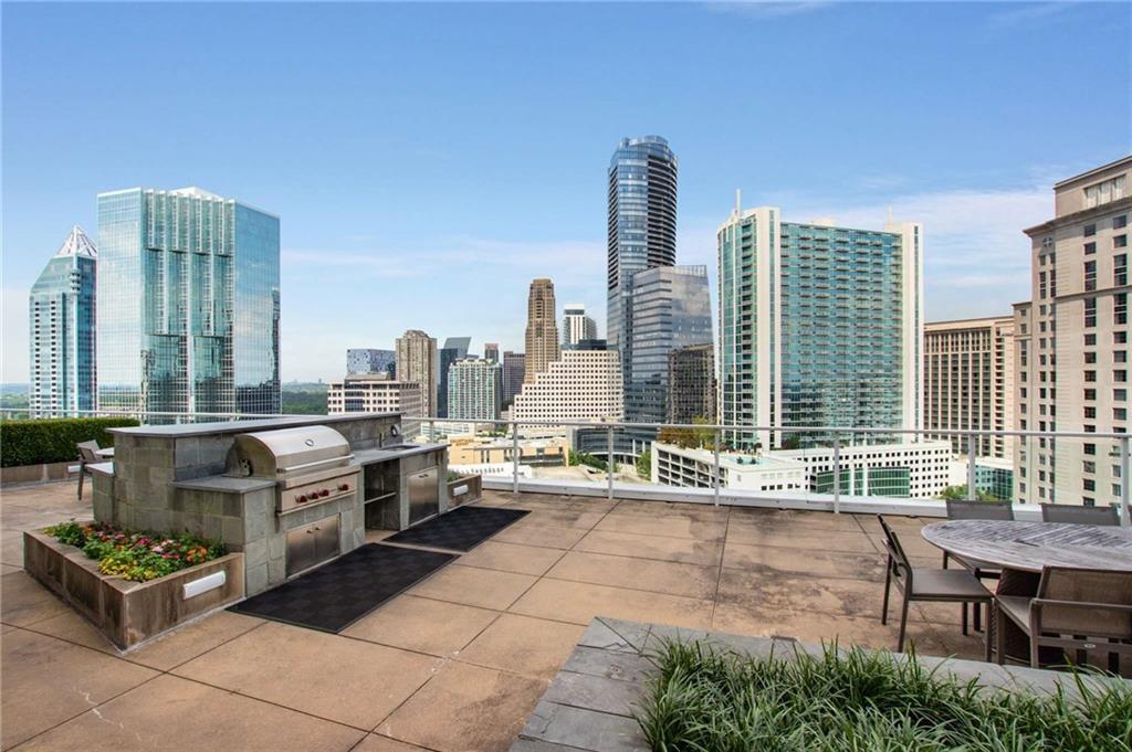 10 Terminus Place Rooftop Deck with grilling area and skyline views